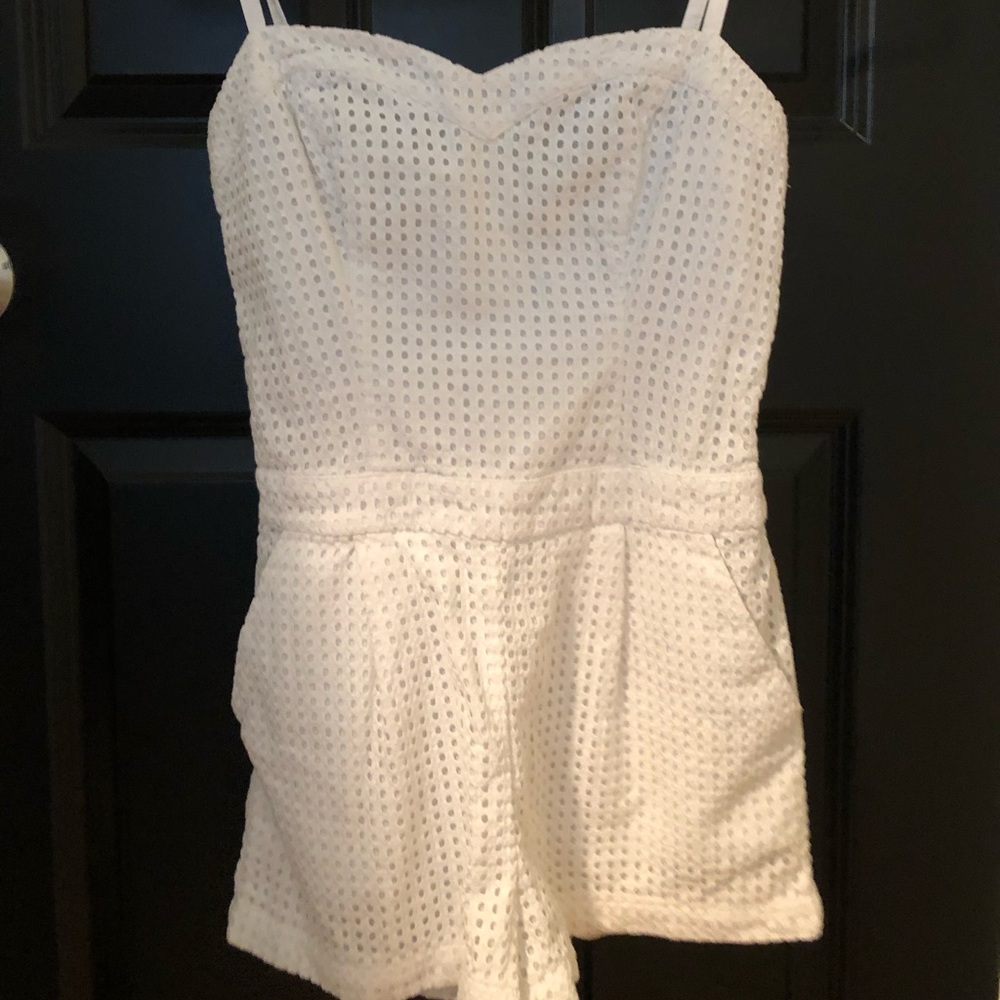 White eyelit romper from Guess